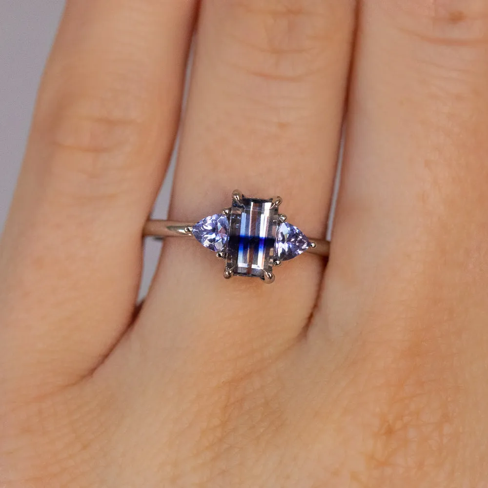 1.11ct Bicolor Emerald Cut Sapphire Three Stone Ring with Tanzanite Trillion Side Stones in Platinum