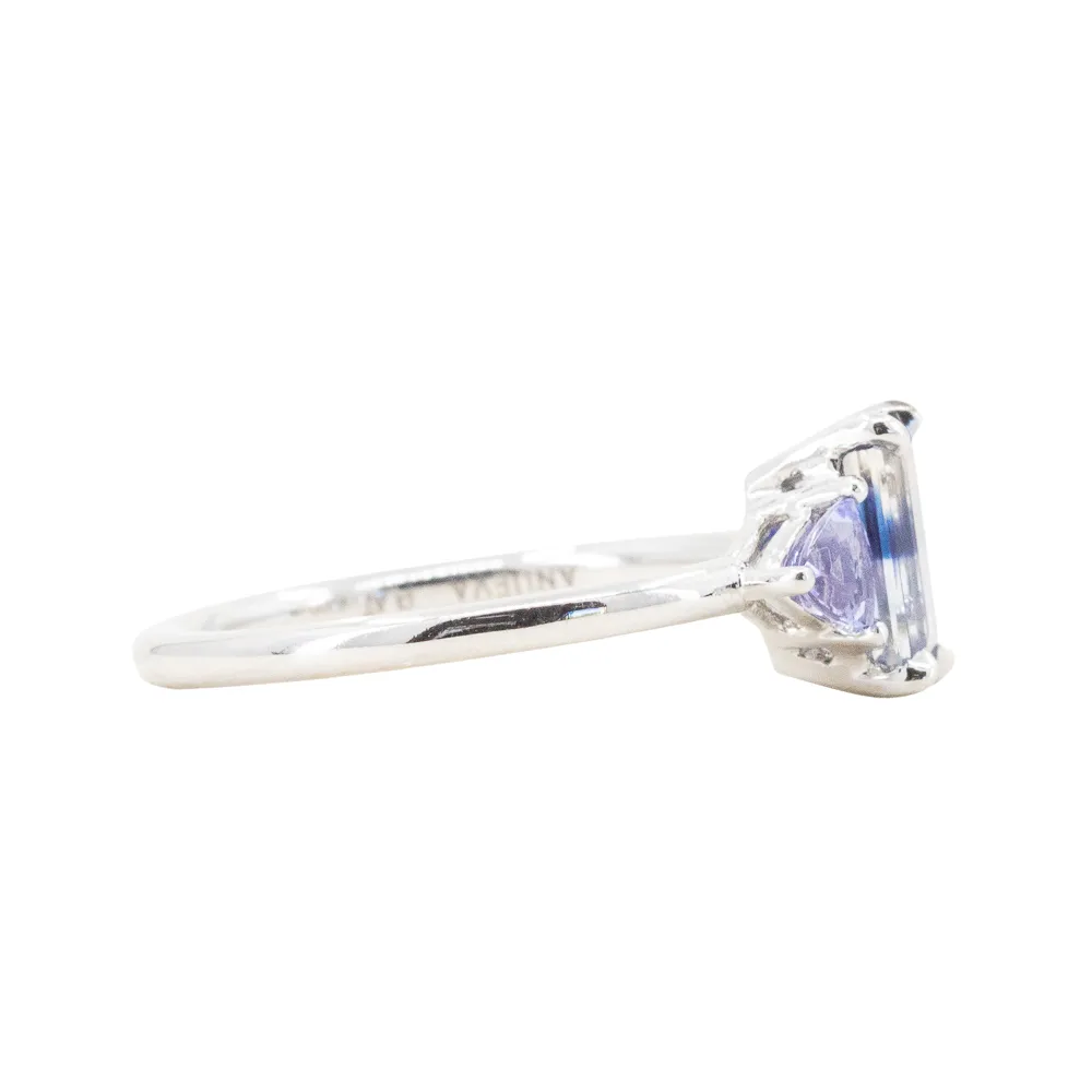 1.11ct Bicolor Emerald Cut Sapphire Three Stone Ring with Tanzanite Trillion Side Stones in Platinum