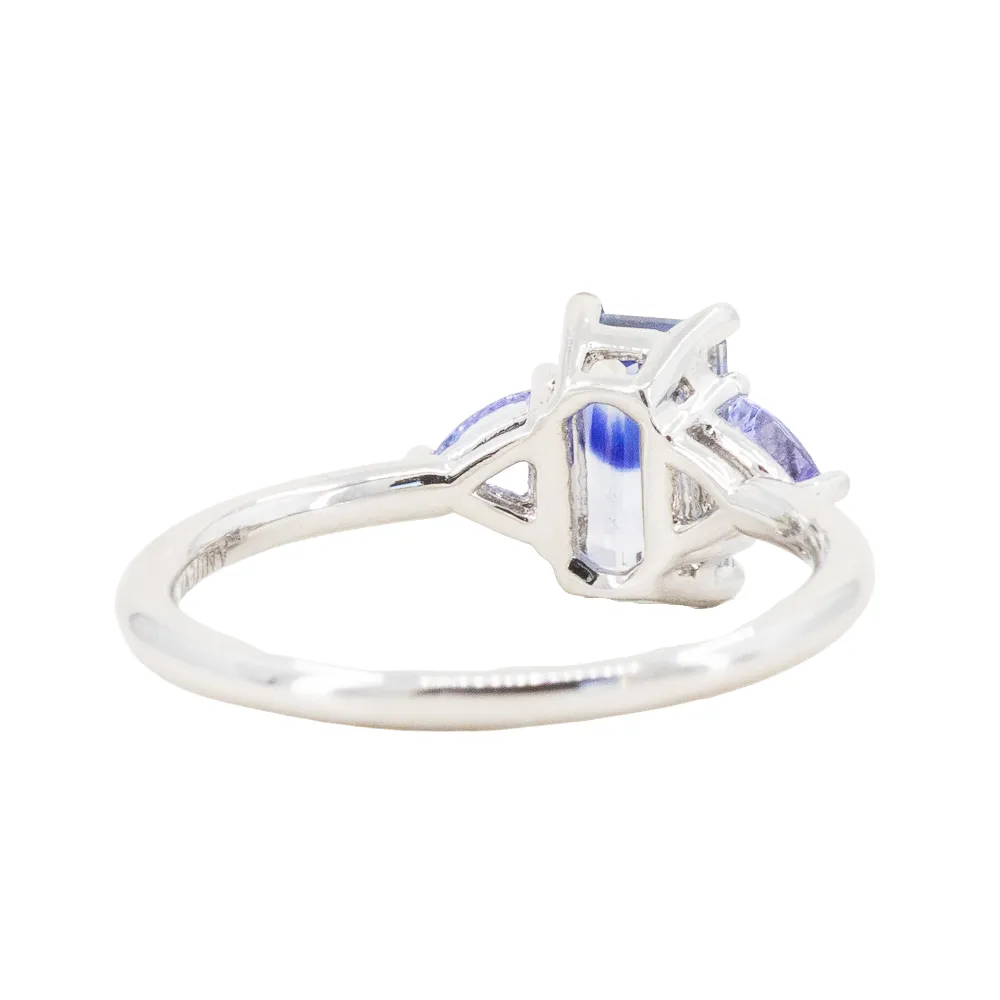 1.11ct Bicolor Emerald Cut Sapphire Three Stone Ring with Tanzanite Trillion Side Stones in Platinum